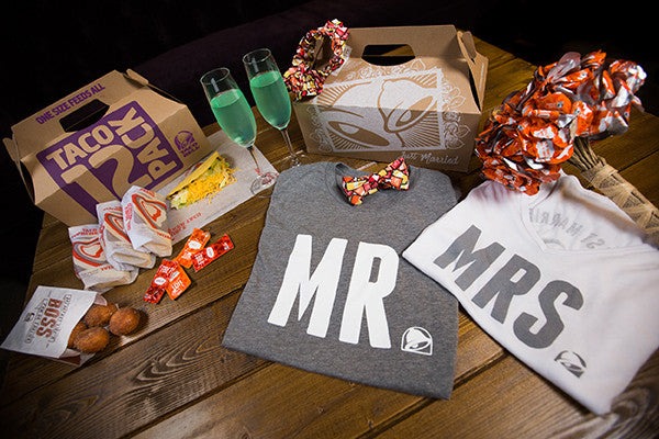 get married at taco bell Taco Bell marriage bundle with tacos, champagne glasses with baja blast mountain dew, a hot sauce bouquet, and Mr. and Mrs. Taco Bell shirts | Get married at Taco Bell