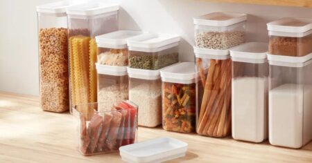 storage containers on a counter with food in them