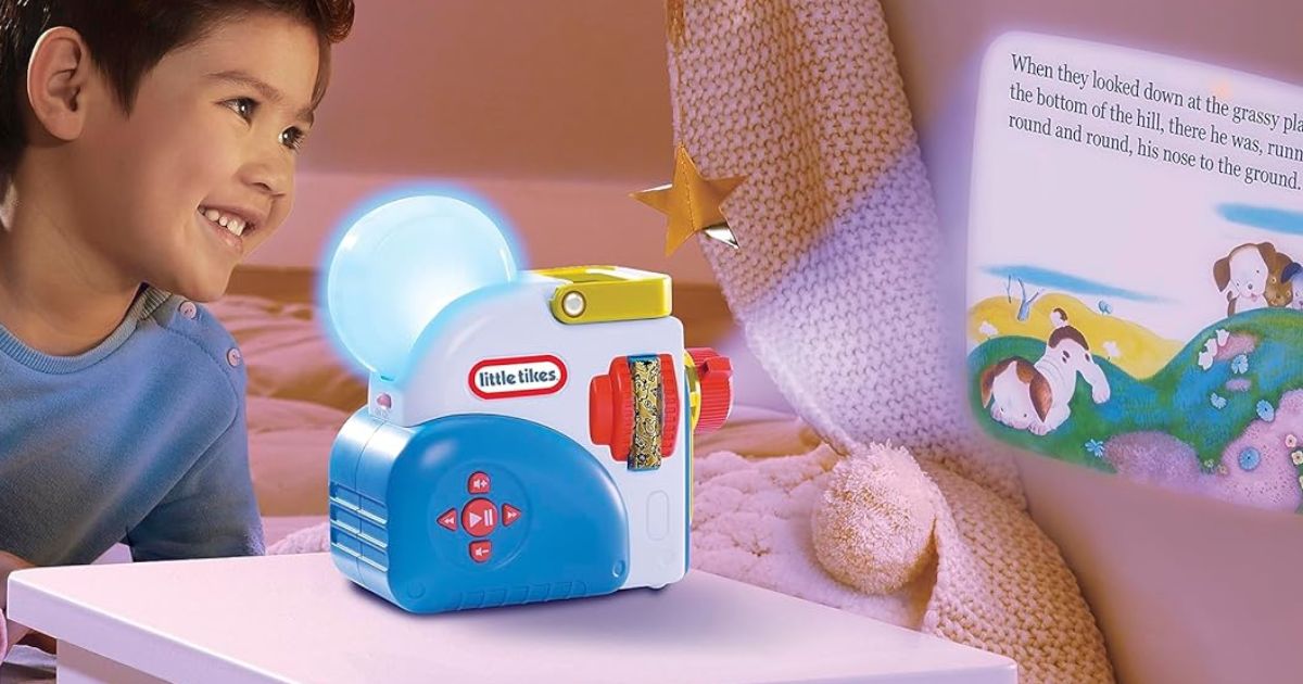 boy looking at a kids projector