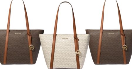 row of Michael Kors totes