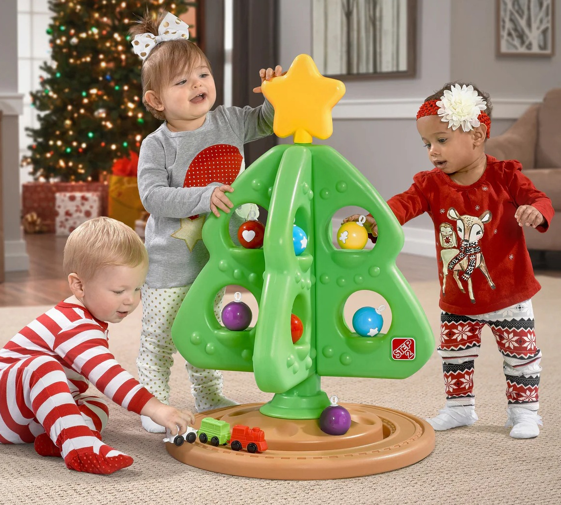 Step2 Christmas Tree toddlers playing with a toy christmas tree