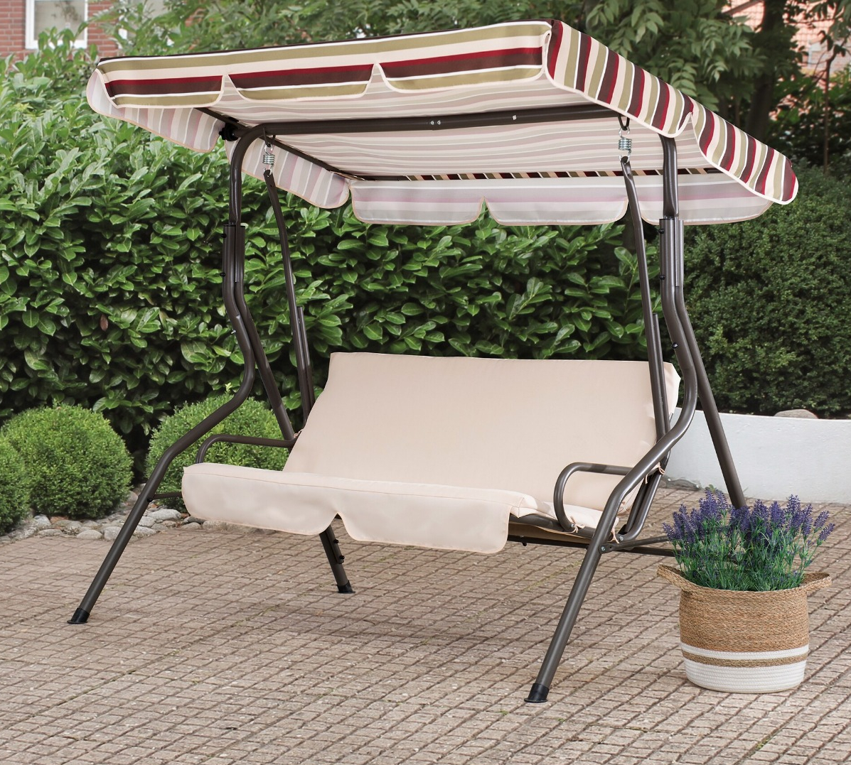 Sunjoy Swings tan swing with red and tan striped awning