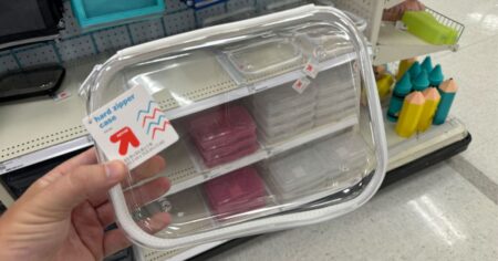 Hand holding a zippered pencil case