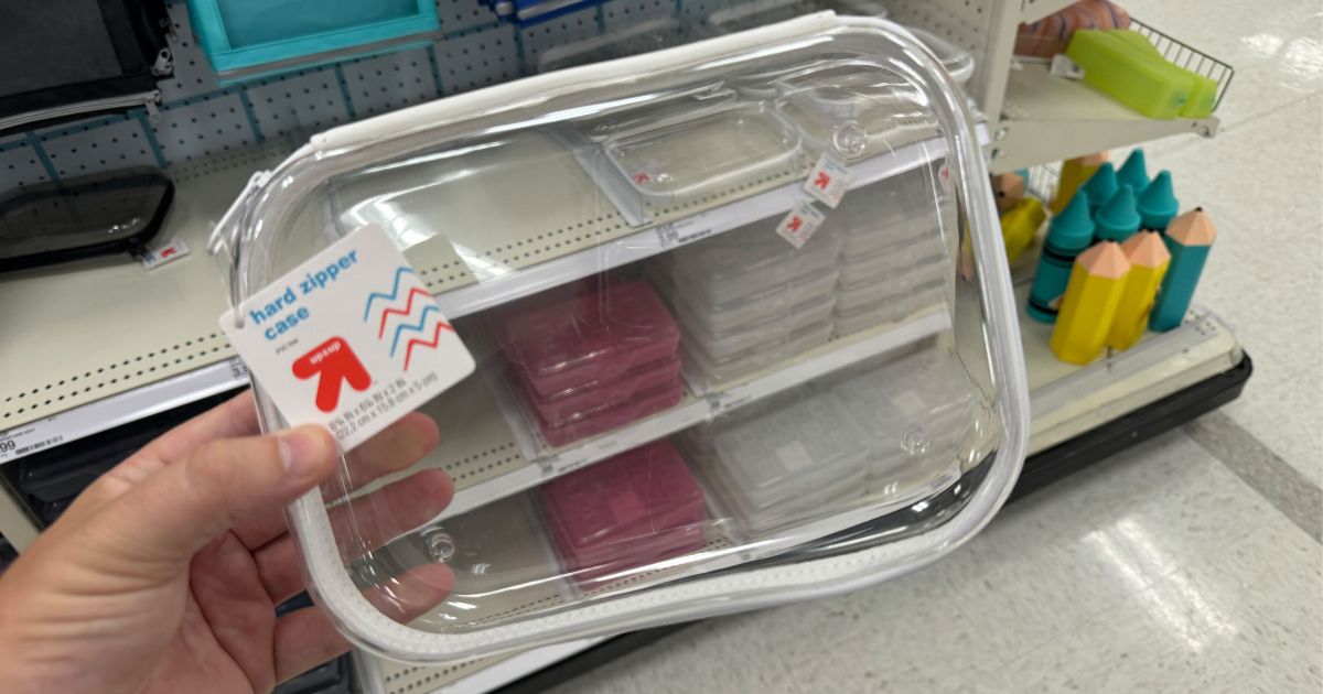 Hand holding a zippered pencil case