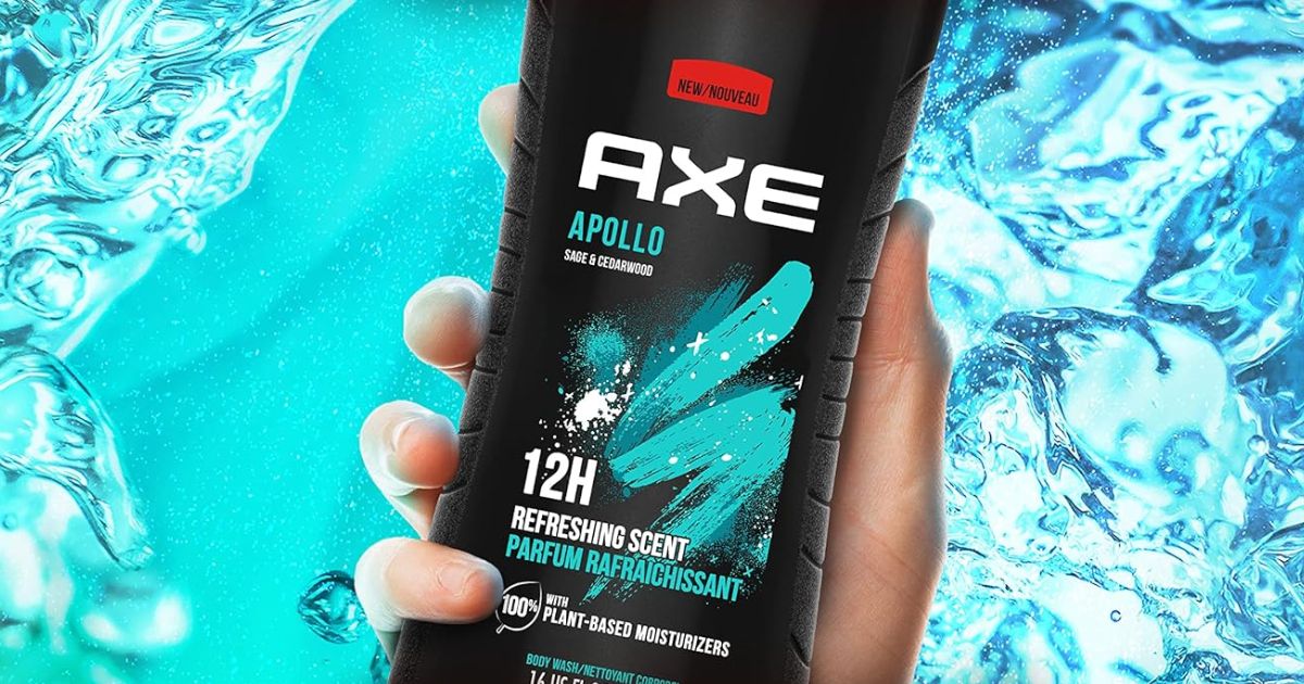 Axe Body Wash hand holding a bottle of Axe body wash