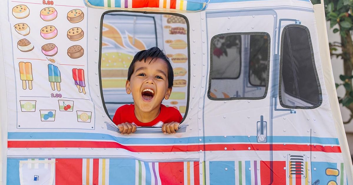 kid in a Food Truck Tent
