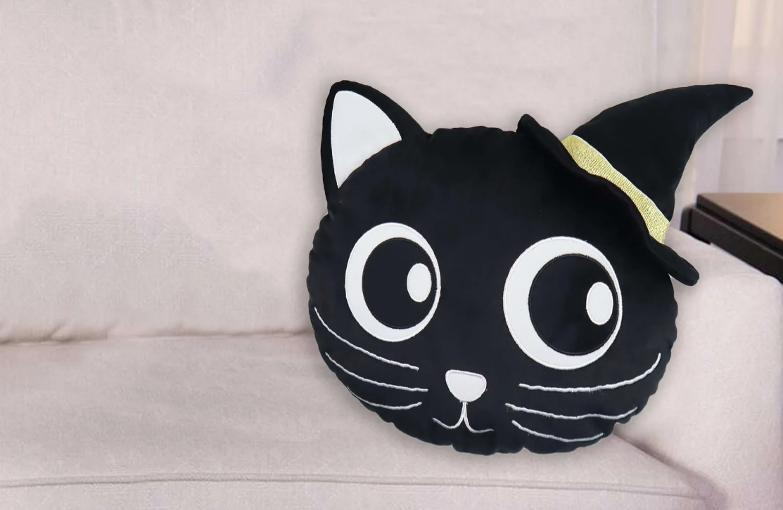 Way to Celebrate Halloween Pillows cat pillow on a couch