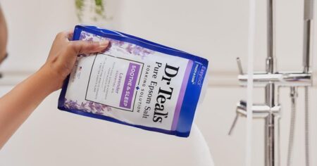 hand holding Dr Teals Epsom Salt