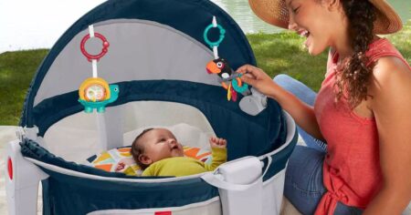 woman looking at a baby