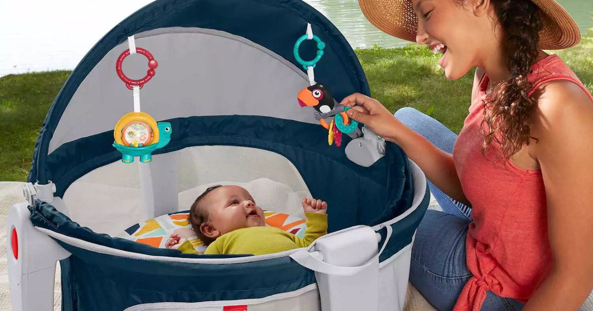 woman looking at a baby