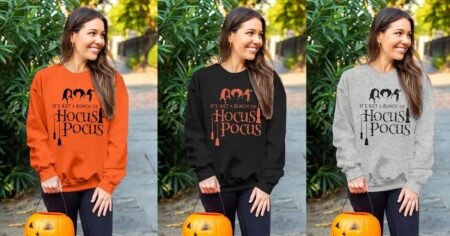 three women wearing Hocus Pocus sweatshirts
