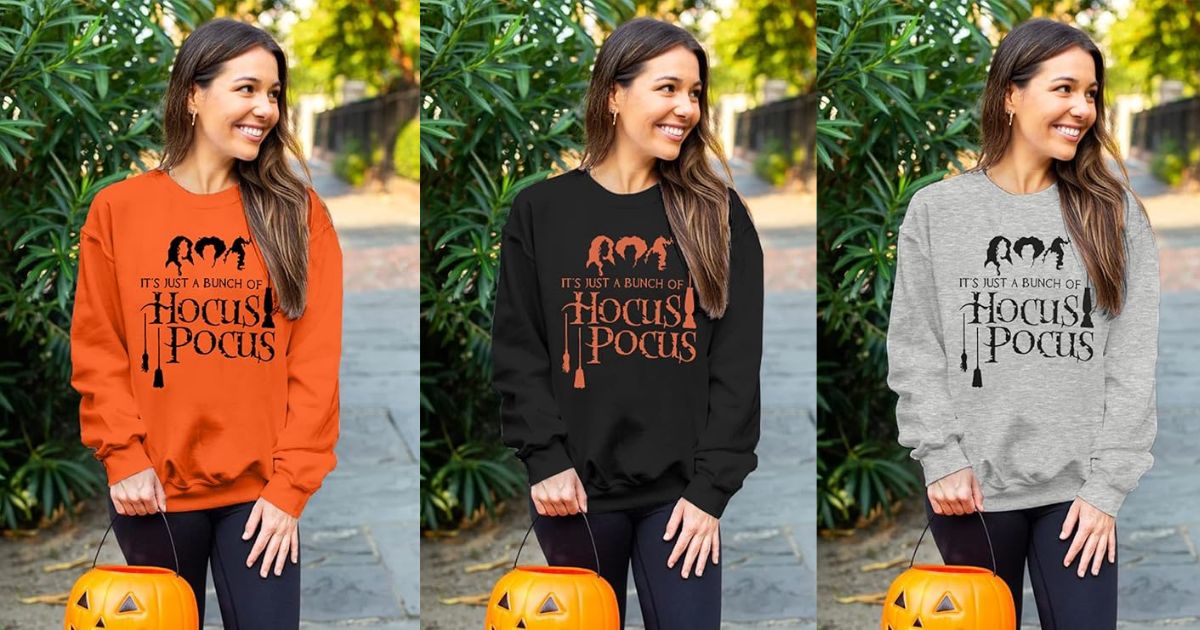 three women wearing Hocus Pocus sweatshirts