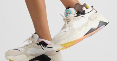 girl wearing Puma x Squishmallows shoes