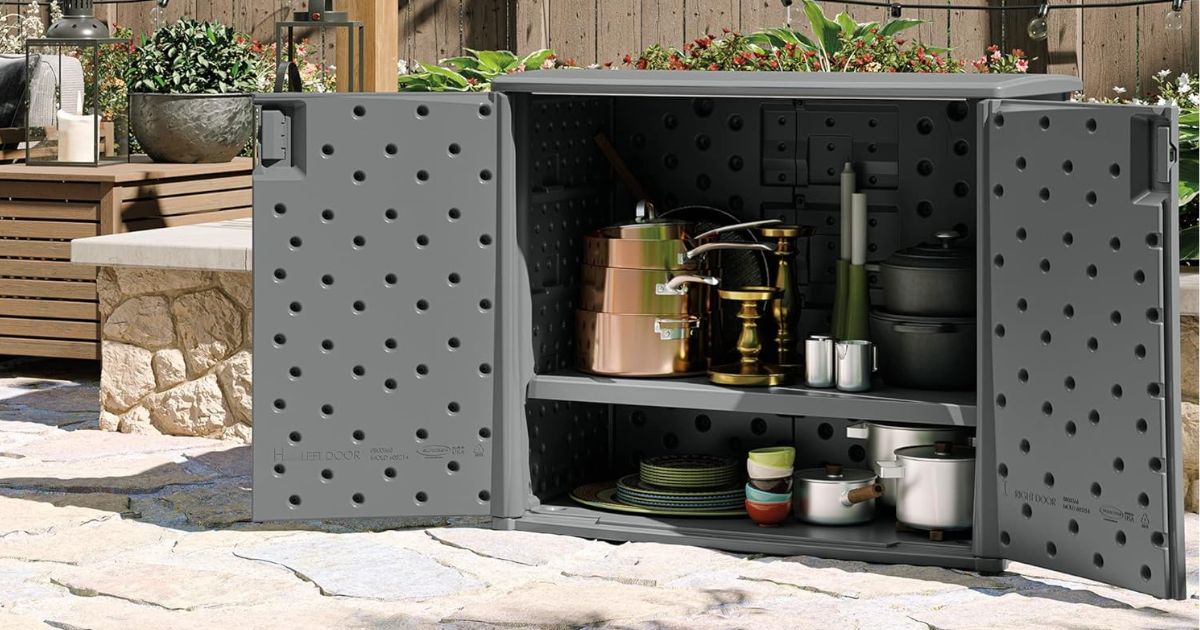 Suncast Storage Cabinet with pots and pans in it