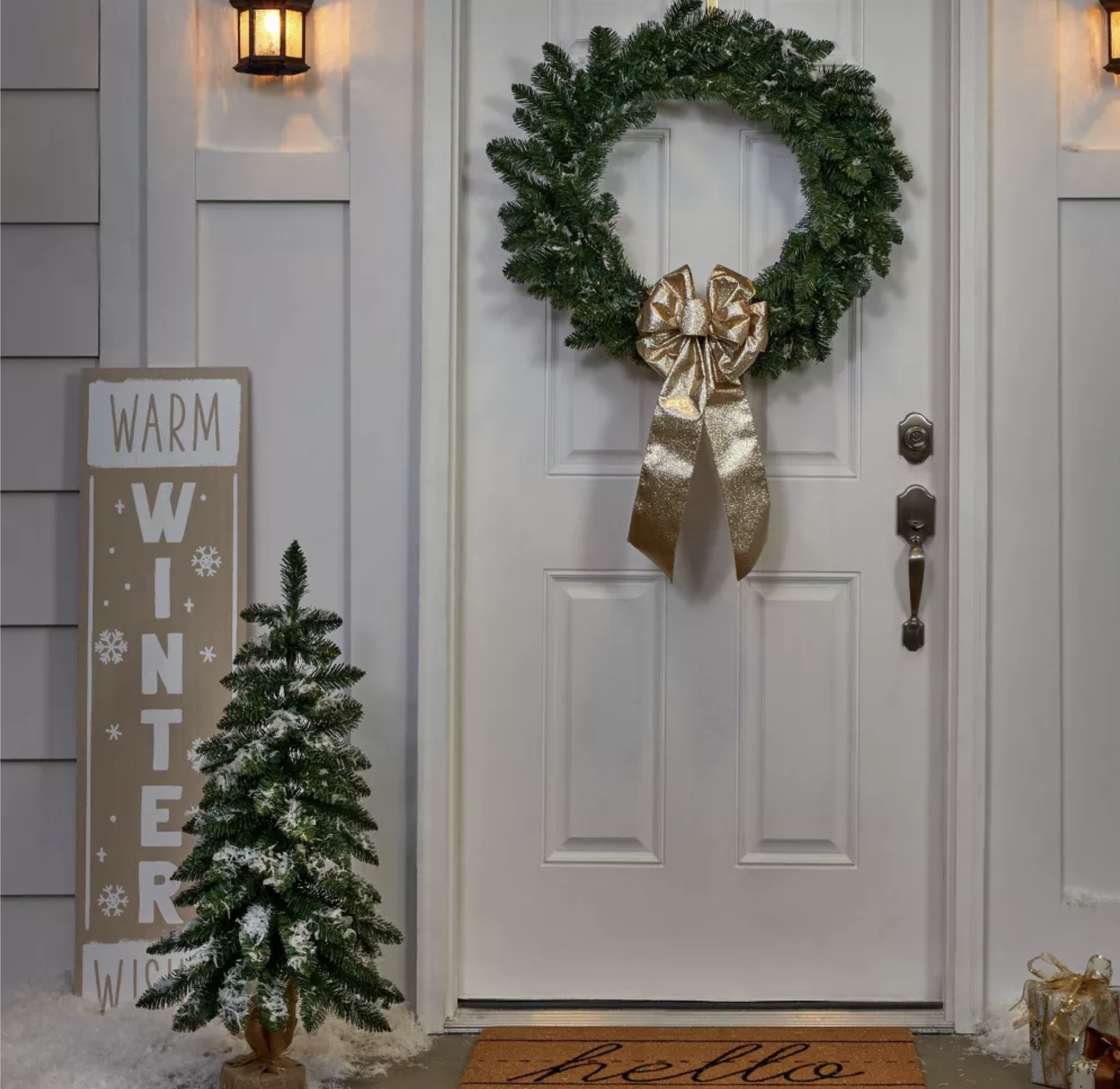 3 Unlit Downswept Alberta Spruce Mini Artificial Christmas Tree with Burlap Base Christmas tree on a porch