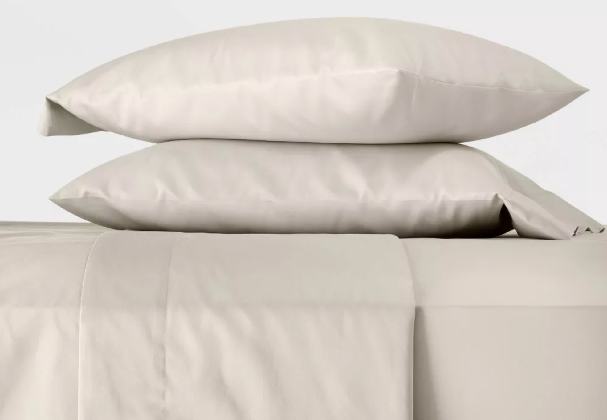 300 Thread Count Temperature Regulating Solid Sheet Set sheets on a bed