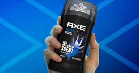 hand holding AXE Deodorant