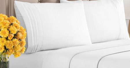 bed with white sheets on it