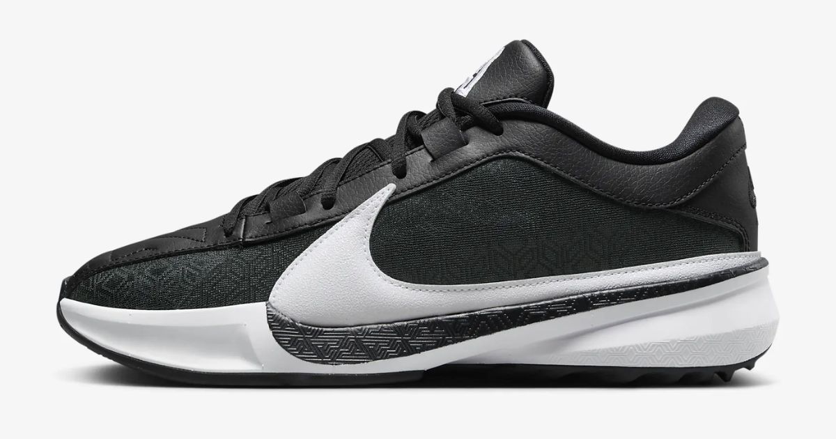 black and white Nike shoe