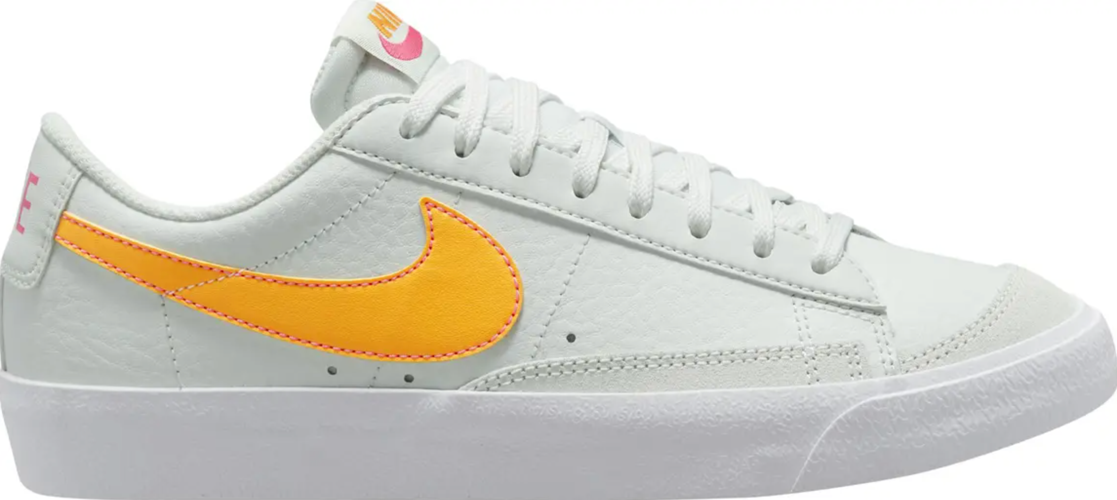 white Nike sneaker with yellow logo