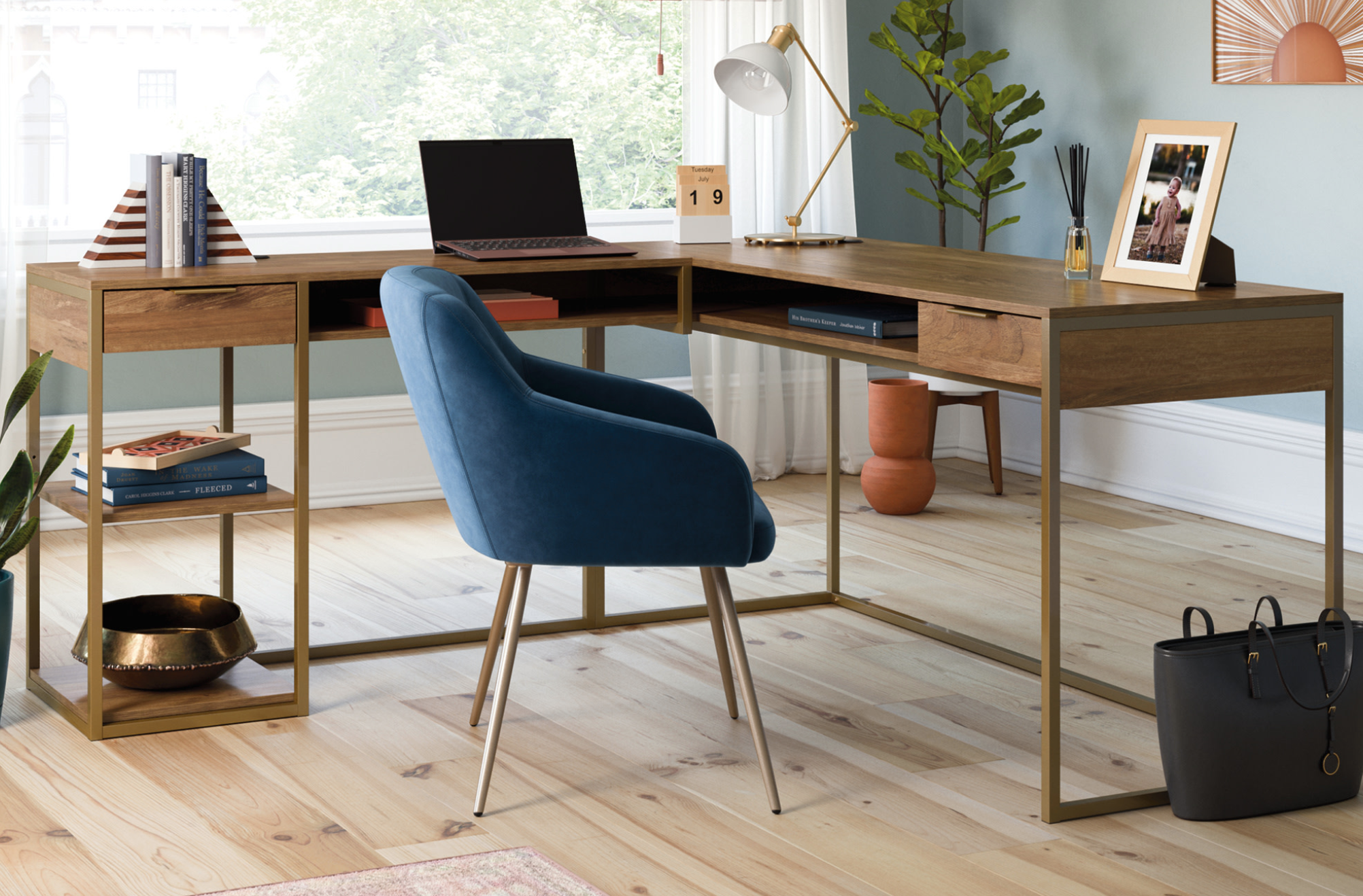 Sauder International Lux Modern L Shaped Desk with Gold Frame desk with a chair by it