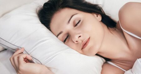 woman sleeping on a pillow