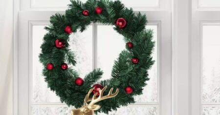 wreath hanging in a window