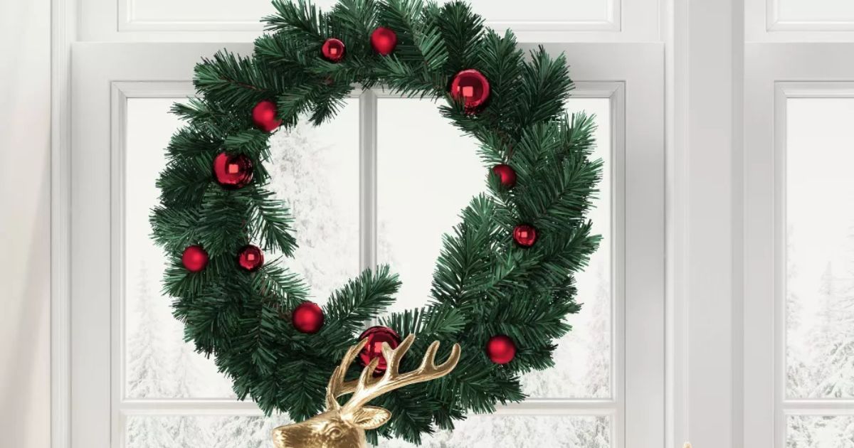 wreath hanging in a window