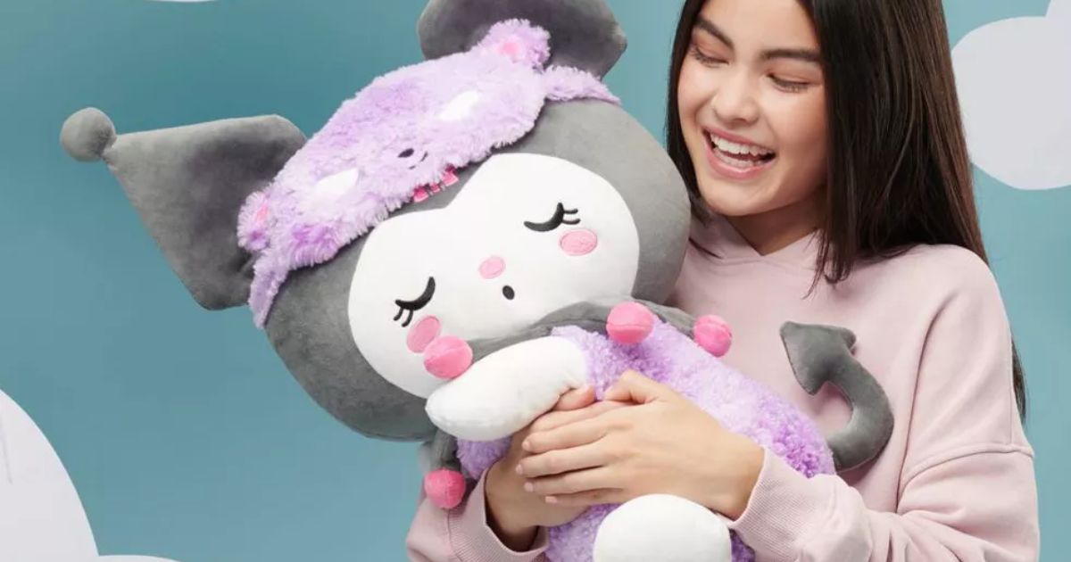 Plush Toy girl holding a plush toy