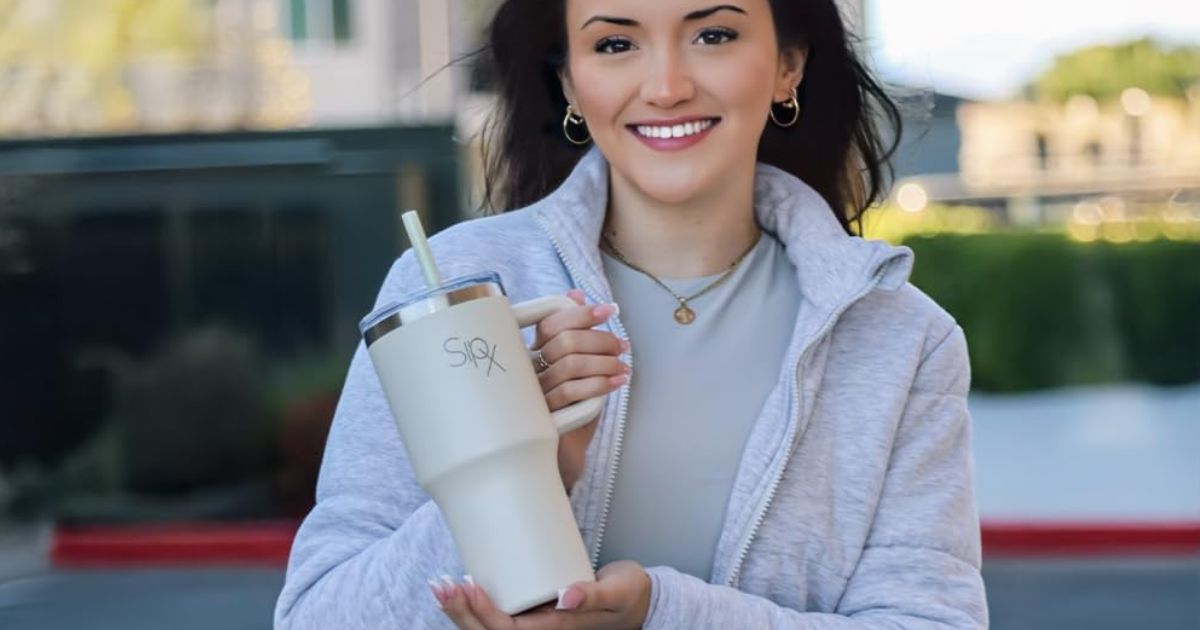 SIPX Tumbler woman holding a tumbler