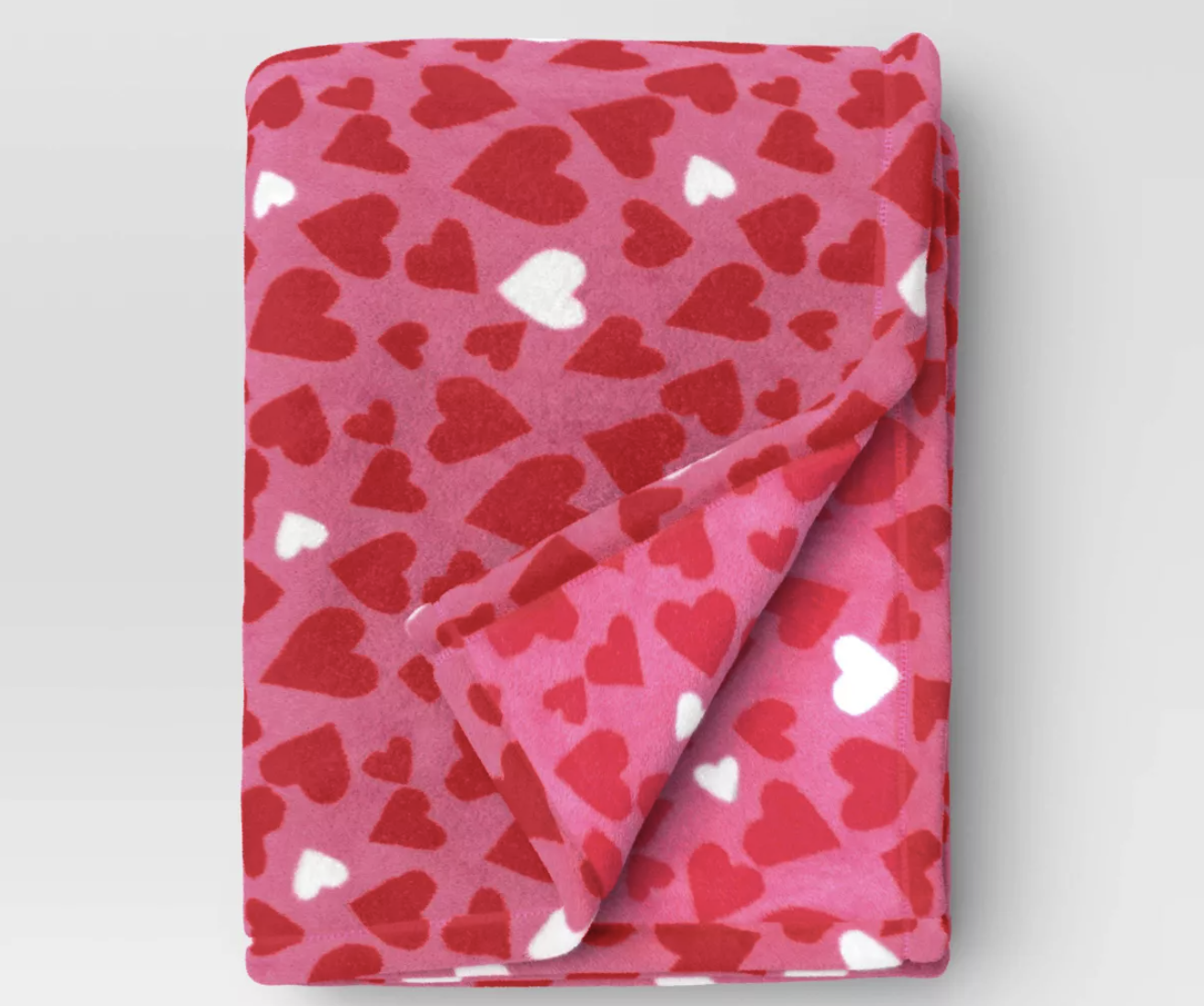 Recycled Printed Plush Throw throw blanket with hearts on it