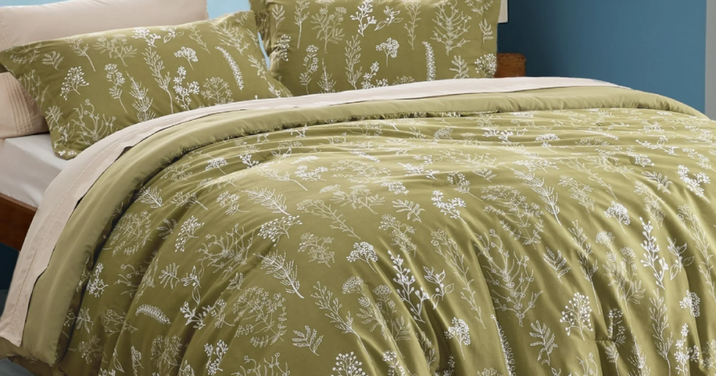 olive green bedding on a bed